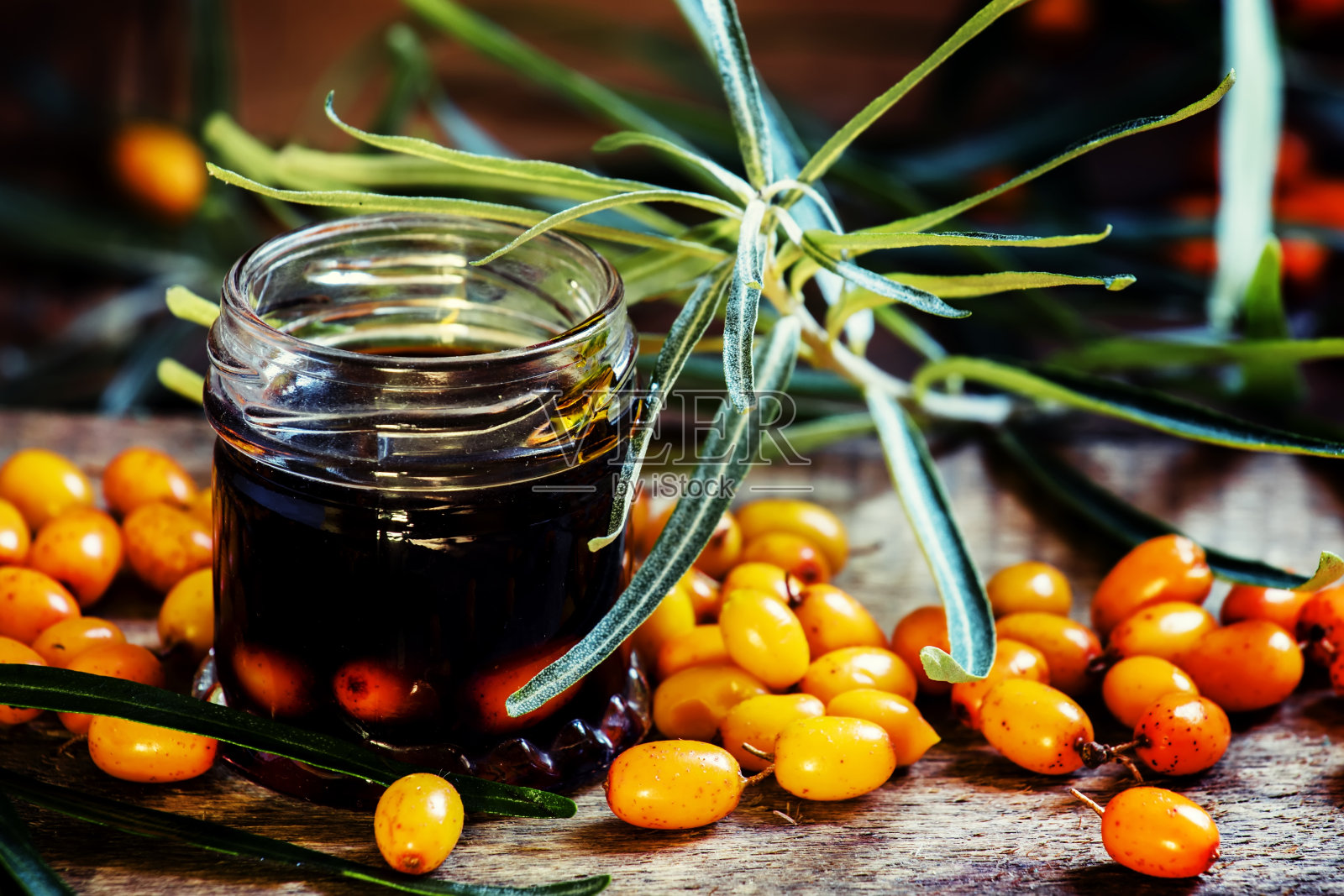 治疗沙棘油照片摄影图片