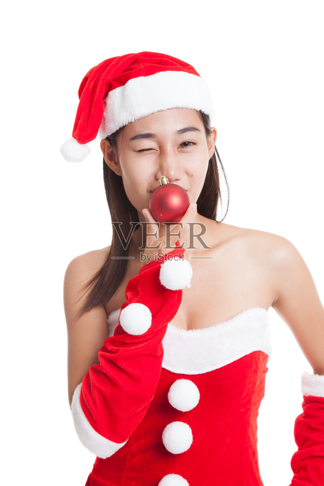 亚洲圣诞老人女孩与彩球。照片摄影图片