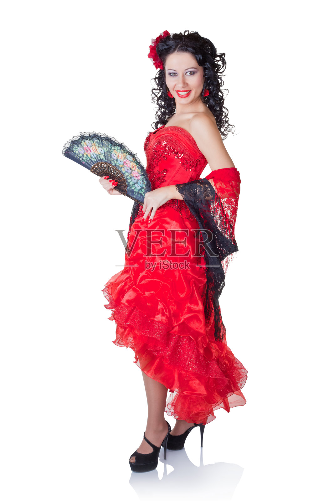 穿着红裙子的漂亮西班牙女人照片摄影图片
