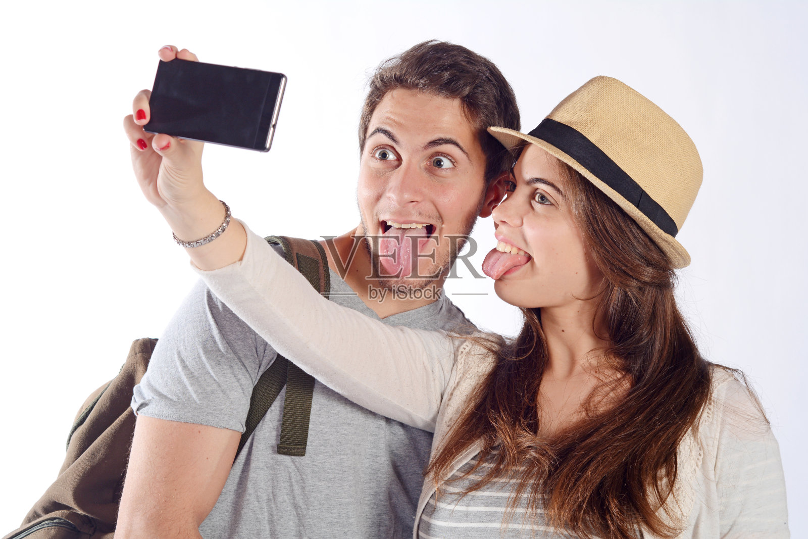 年轻美丽的夫妇在旅行和自拍。照片摄影图片