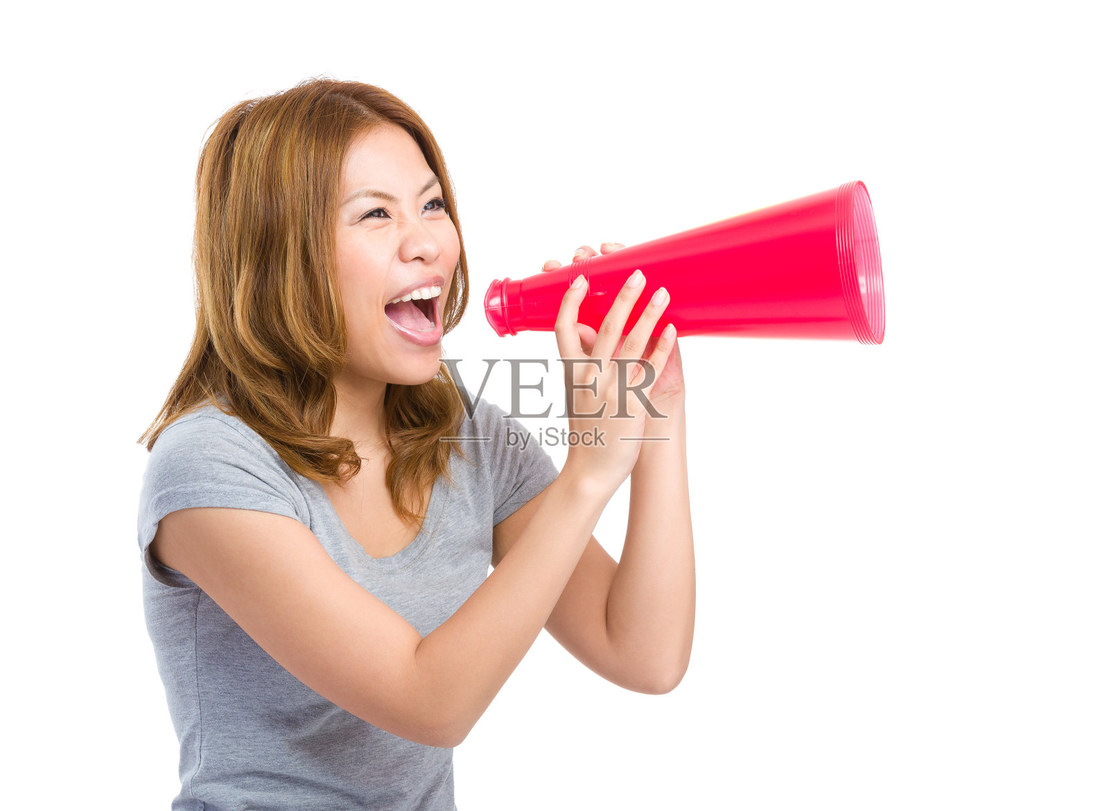 一个中国女人通过扩音器大喊照片摄影图片