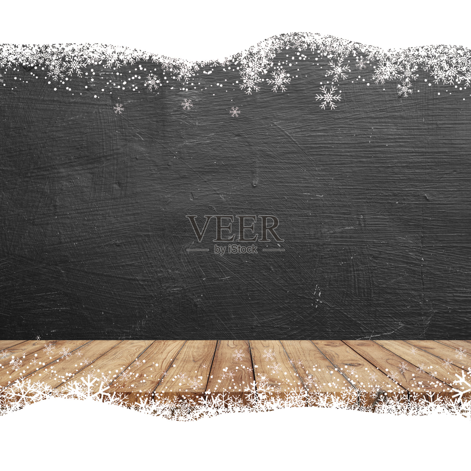 黑板和木地板的边缘几乎是雪花。照片摄影图片