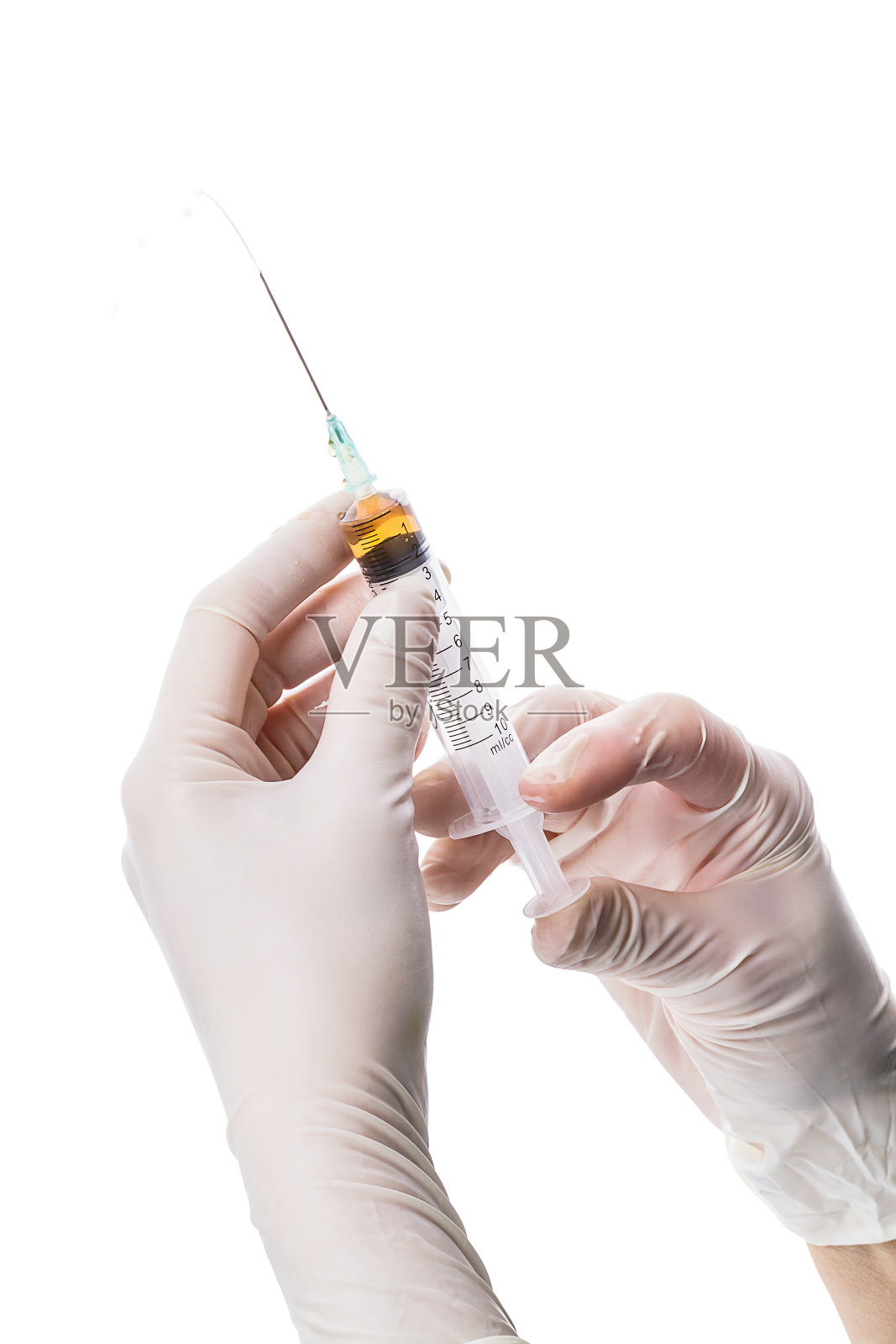 医生手里拿着注射器照片摄影图片