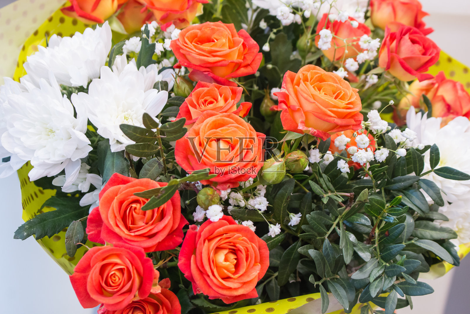 一大束橙红色的茶玫瑰照片摄影图片