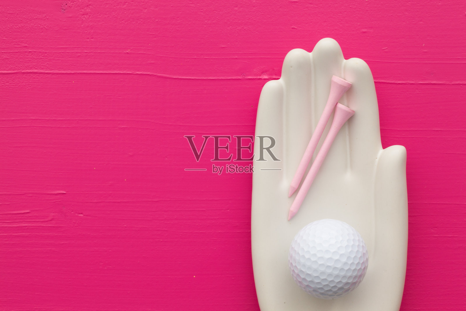 细节的人造手与高尔夫设备照片摄影图片