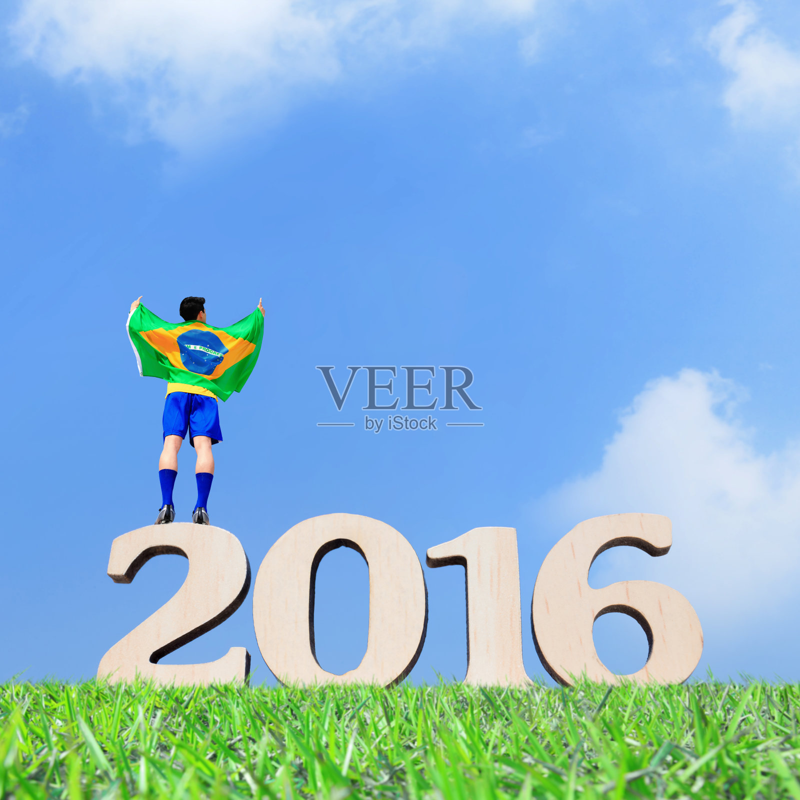 兴奋的人与巴西国旗照片摄影图片