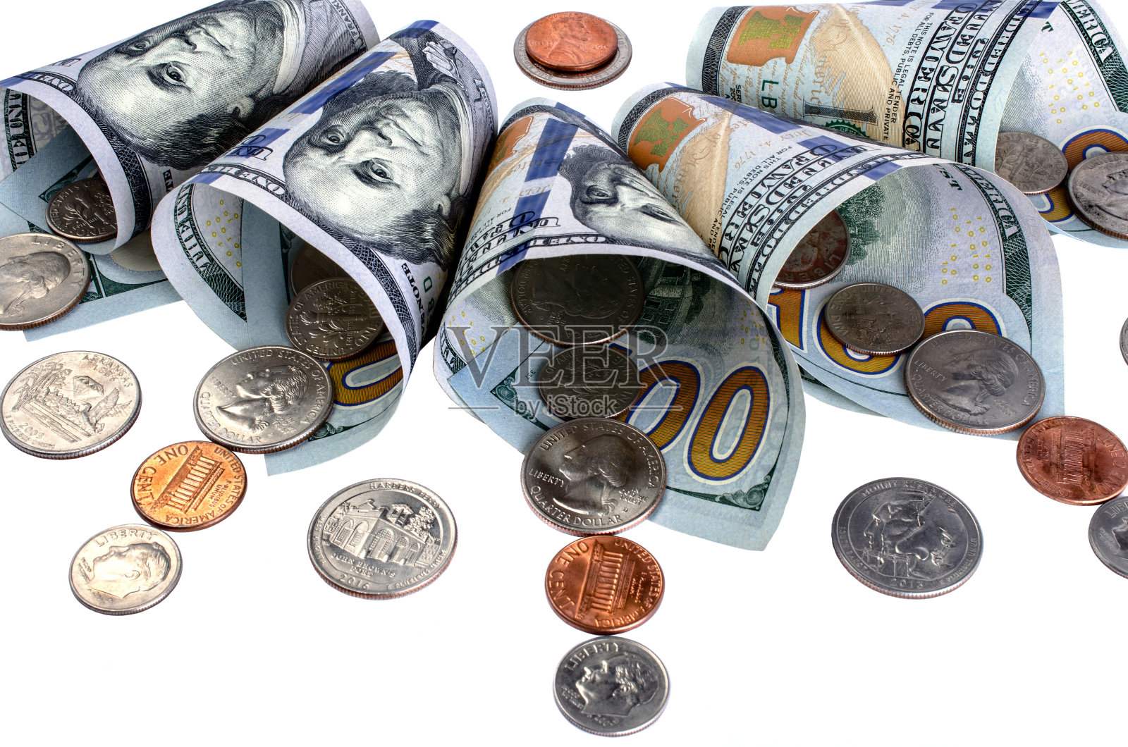 钞票百元与硬币分离。照片摄影图片