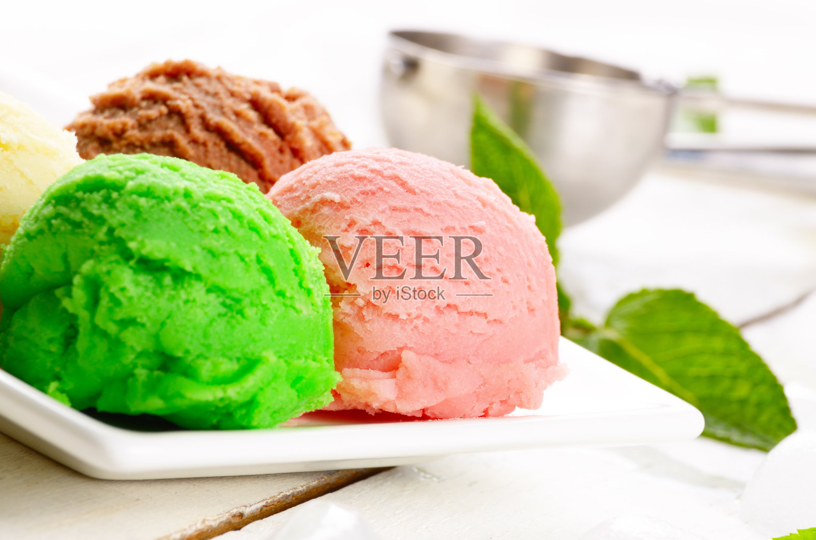 三个冰淇淋勺照片摄影图片