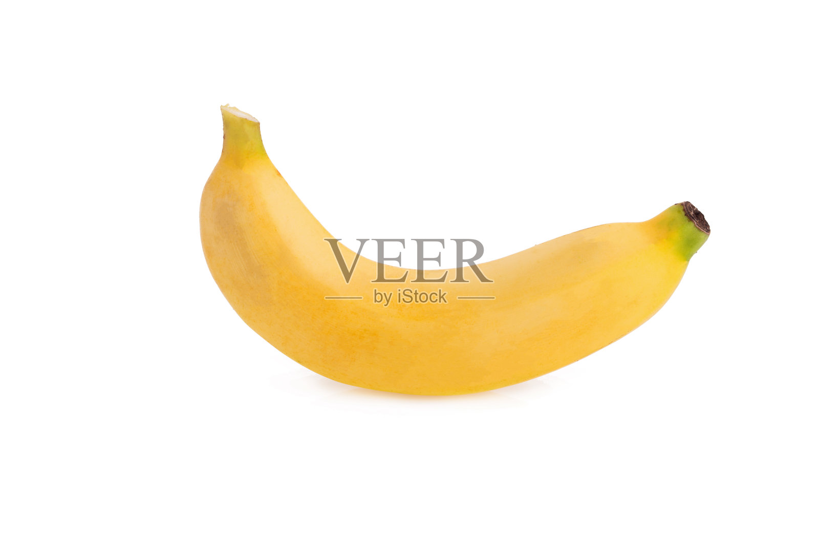 白色背景上的黄色香蕉。照片摄影图片