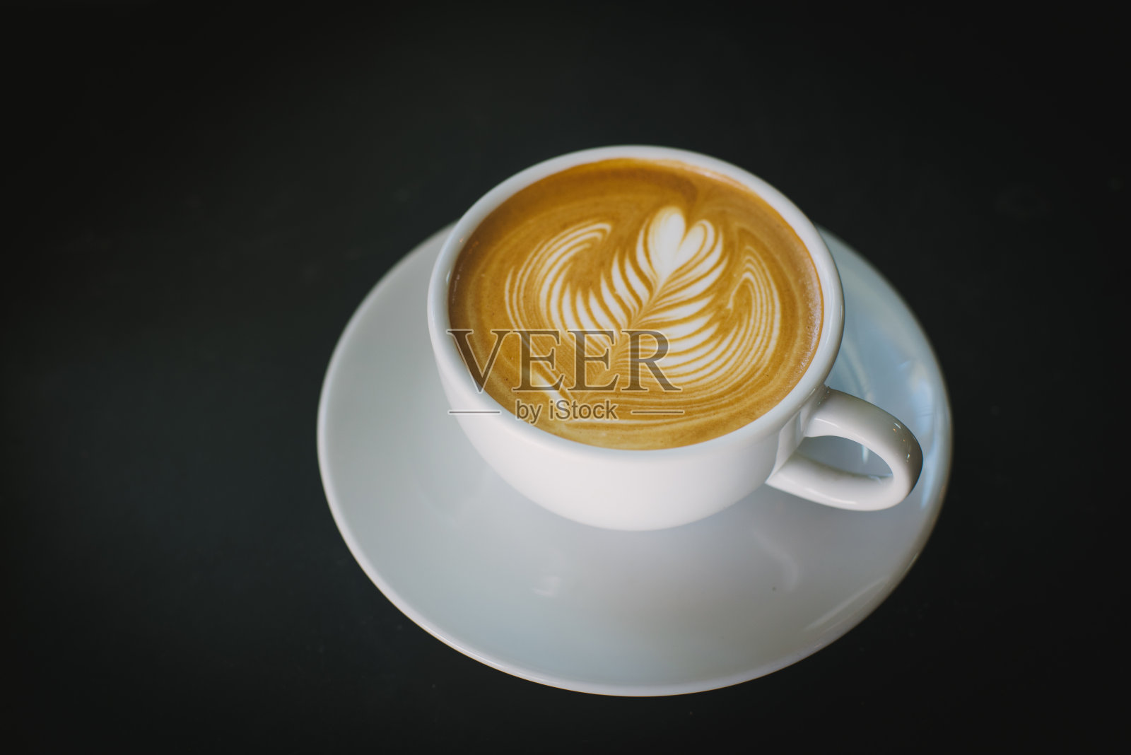 咖啡店的咖啡拿铁艺术照片摄影图片