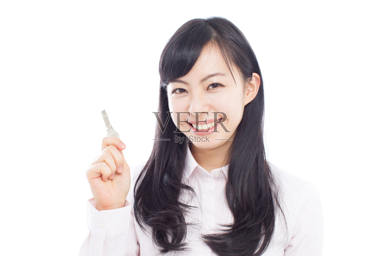 一个拿着钥匙的日本女人照片摄影图片