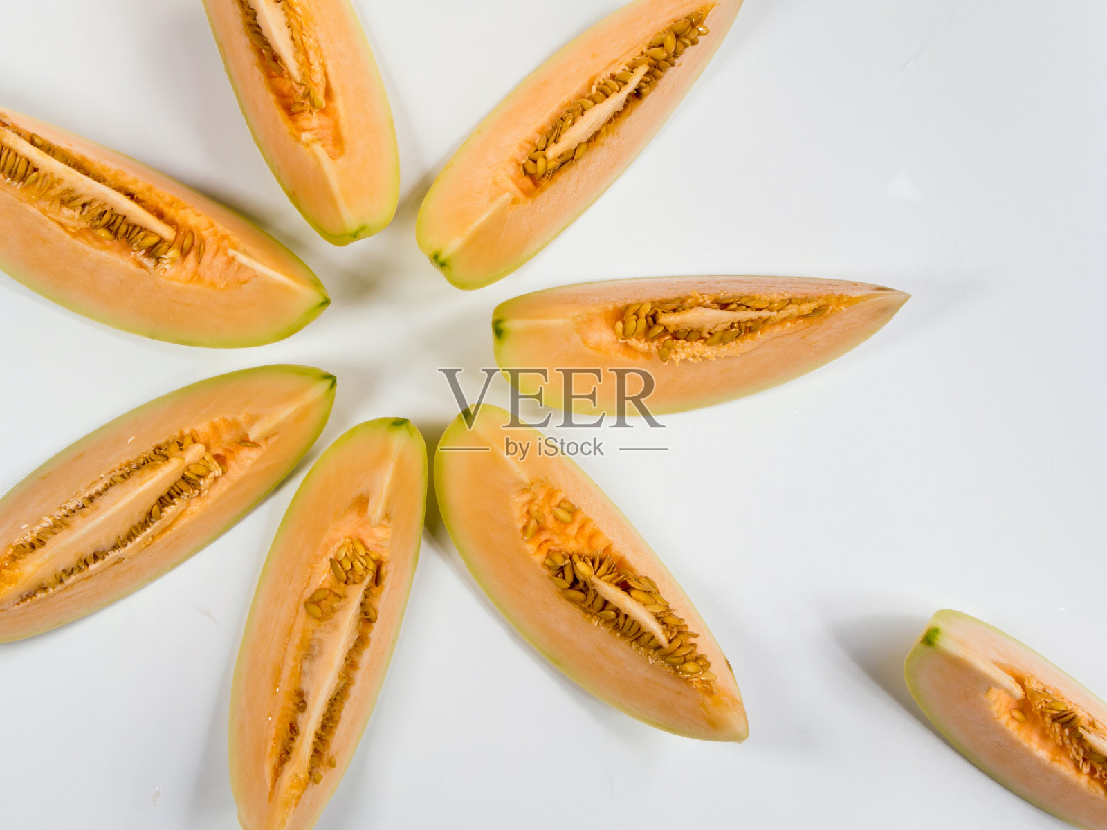哈密瓜片摆放整齐照片摄影图片