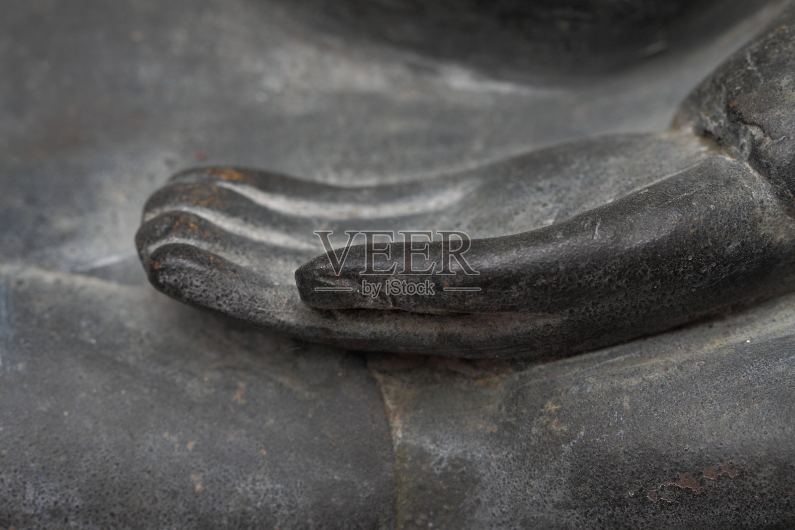 重点选择了古代青铜手佛的形象。照片摄影图片