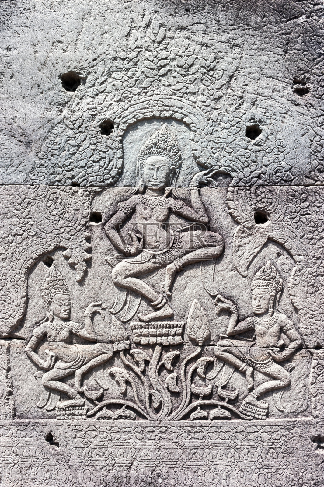 雕刻在吴哥的石墙上，暹粒照片摄影图片