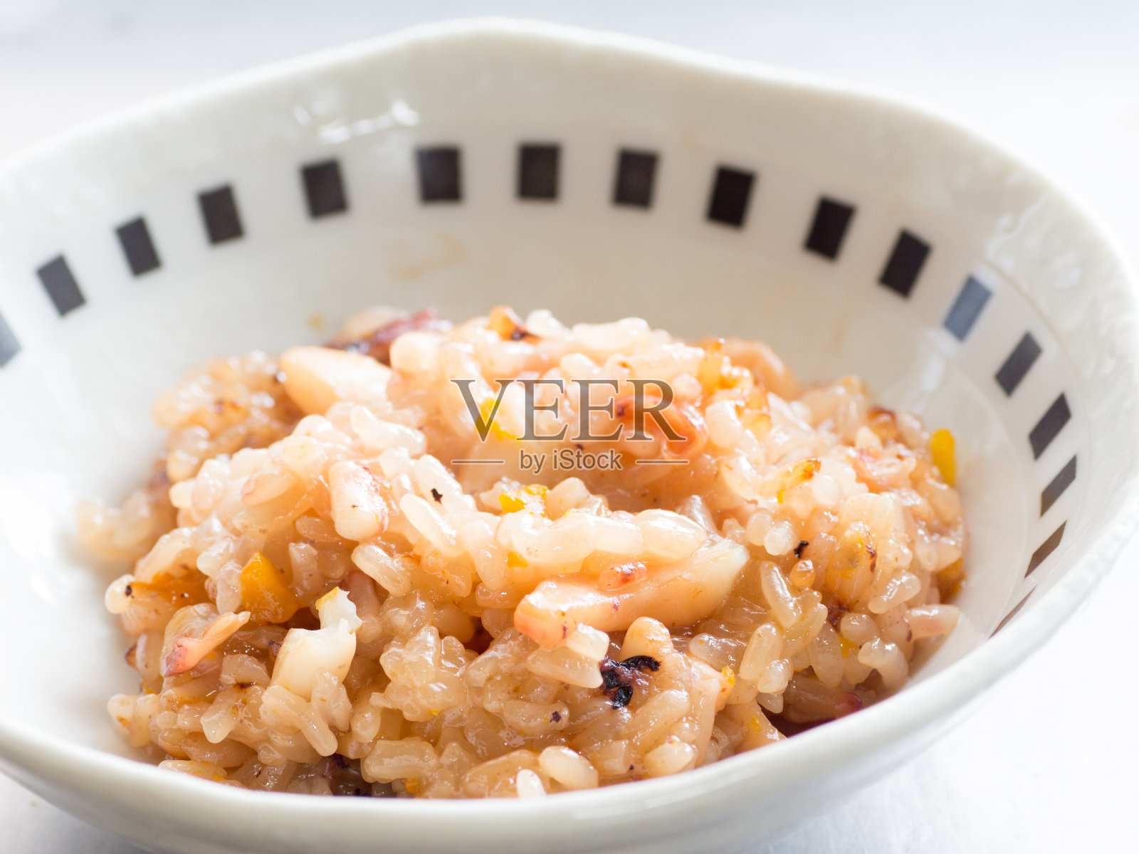 日本料理，鱿鱼蒸糯米饭照片摄影图片