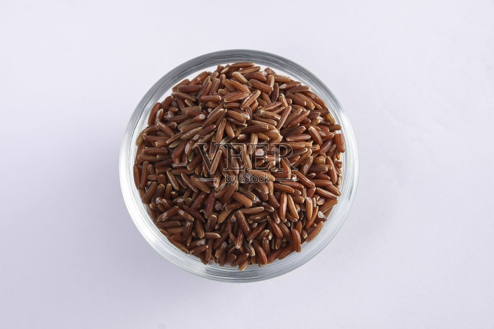 玻璃碗里盛着红米照片摄影图片