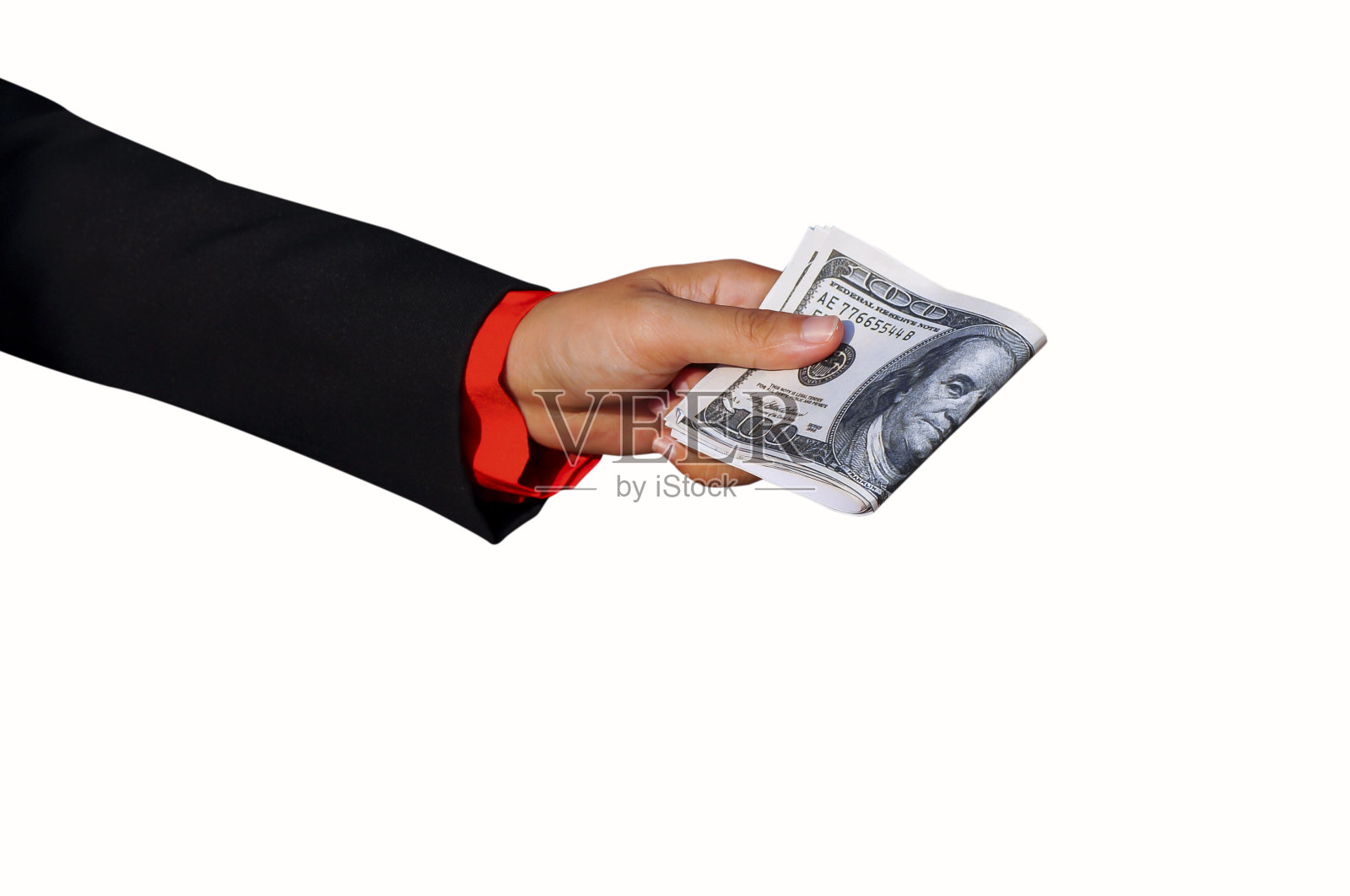 男人手里拿着一叠钱。照片摄影图片