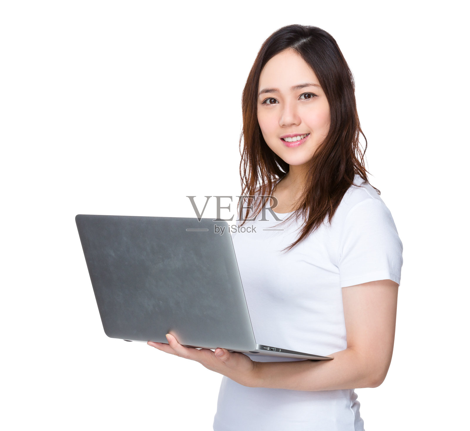 手持笔记本电脑的女子照片摄影图片