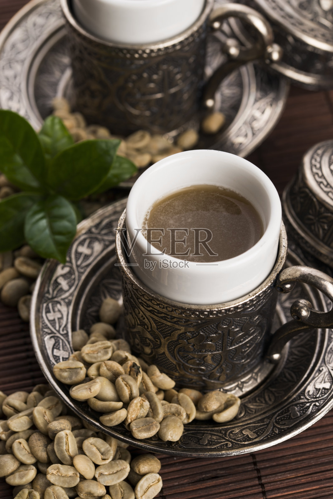 绿色的咖啡。饮料和豆类照片摄影图片