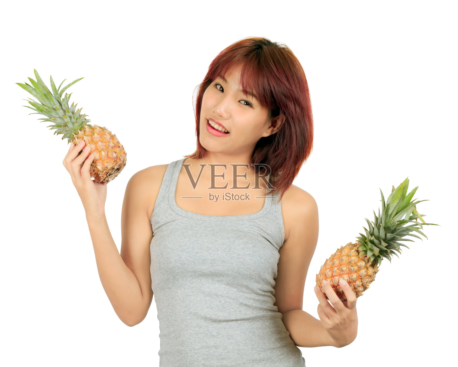 孤立的年轻亚洲女人和菠萝照片摄影图片
