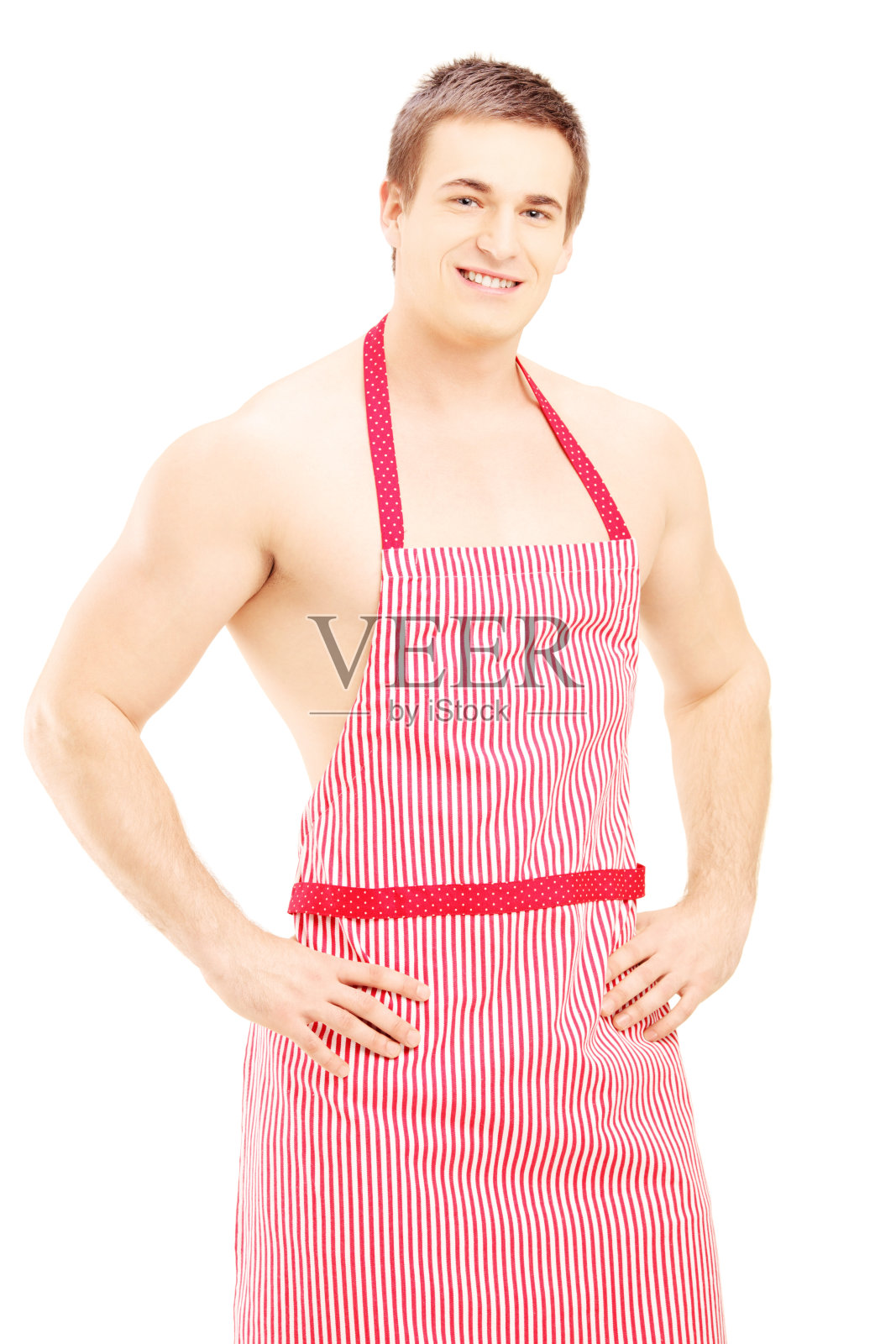 赤裸上身，穿着红围裙的英俊男子照片摄影图片