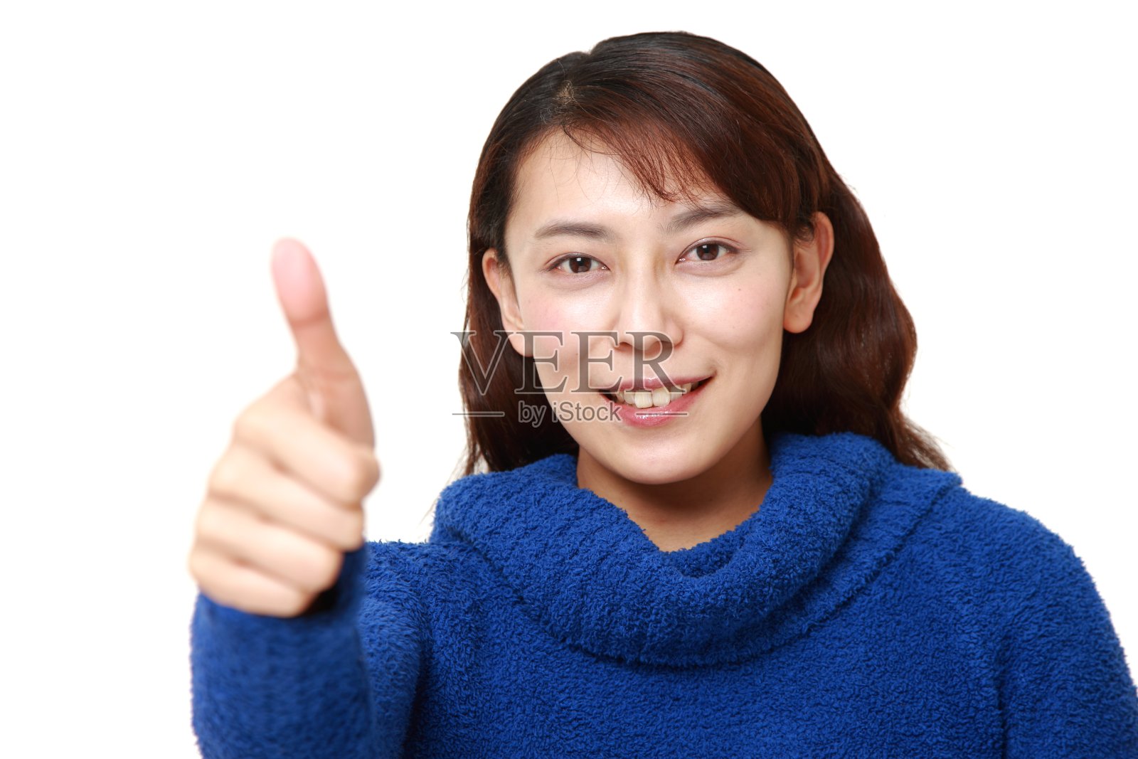 竖起大拇指的女人照片摄影图片