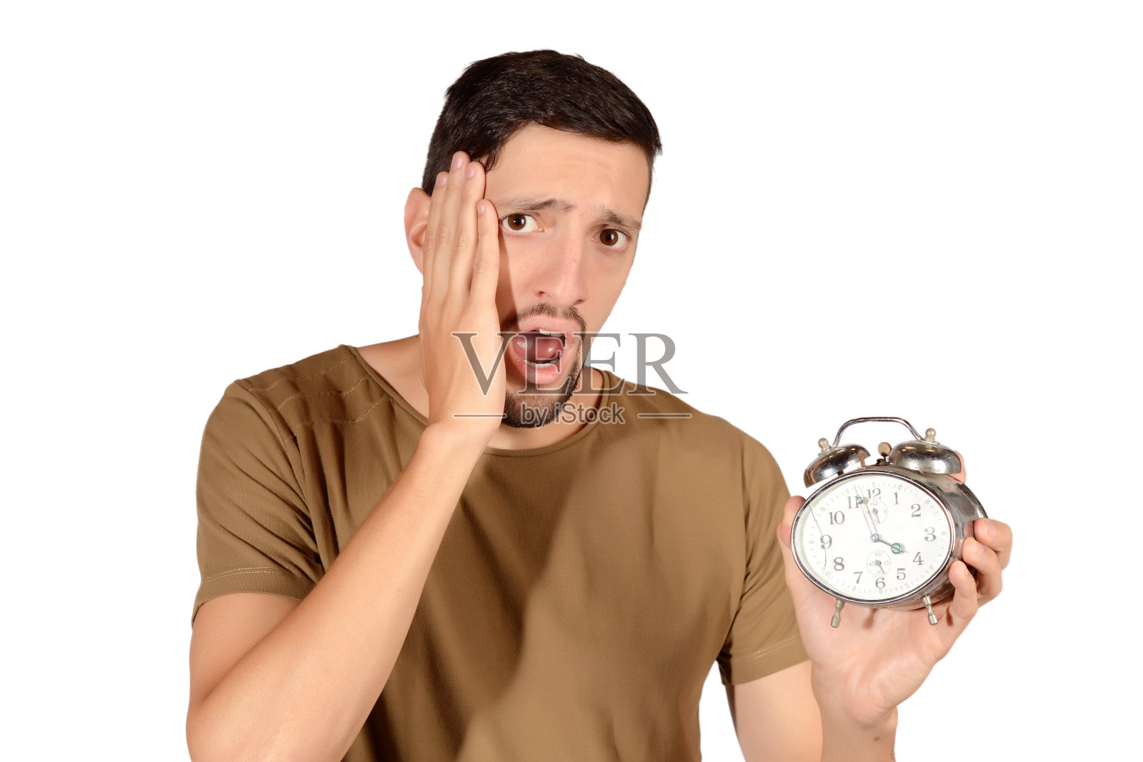 有闹钟的人。照片摄影图片