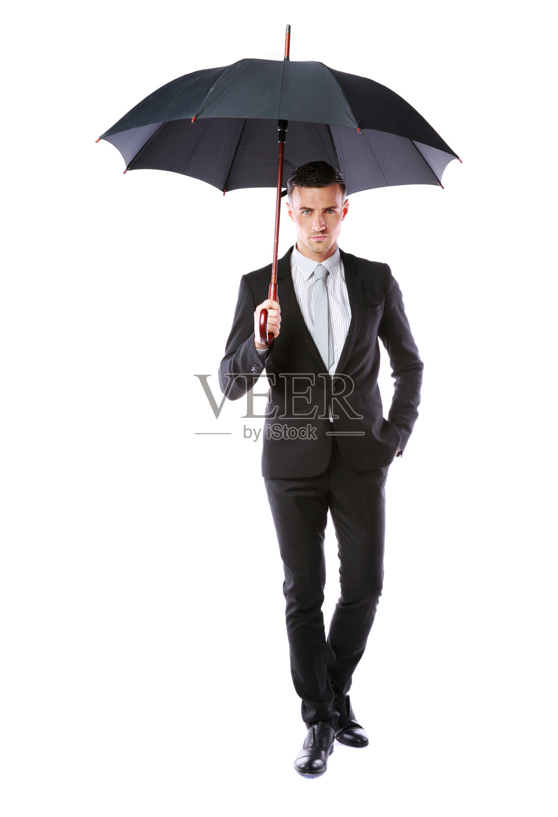 商人拿着伞照片摄影图片