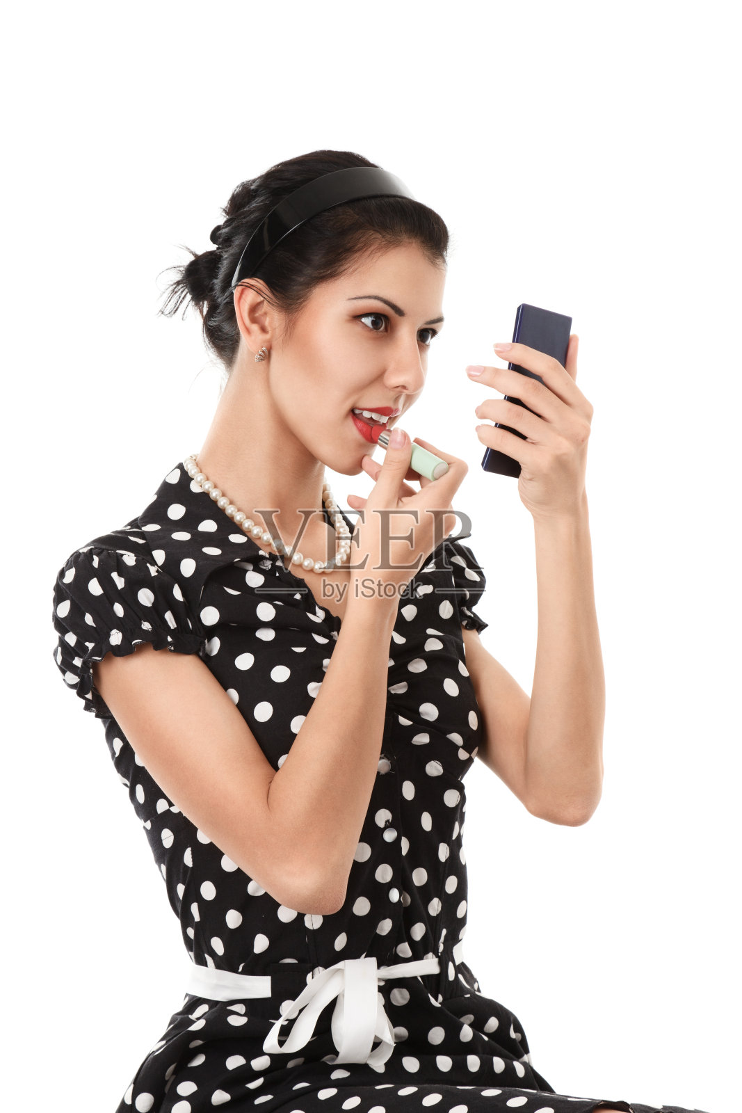 小女孩涂嘴唇照片摄影图片