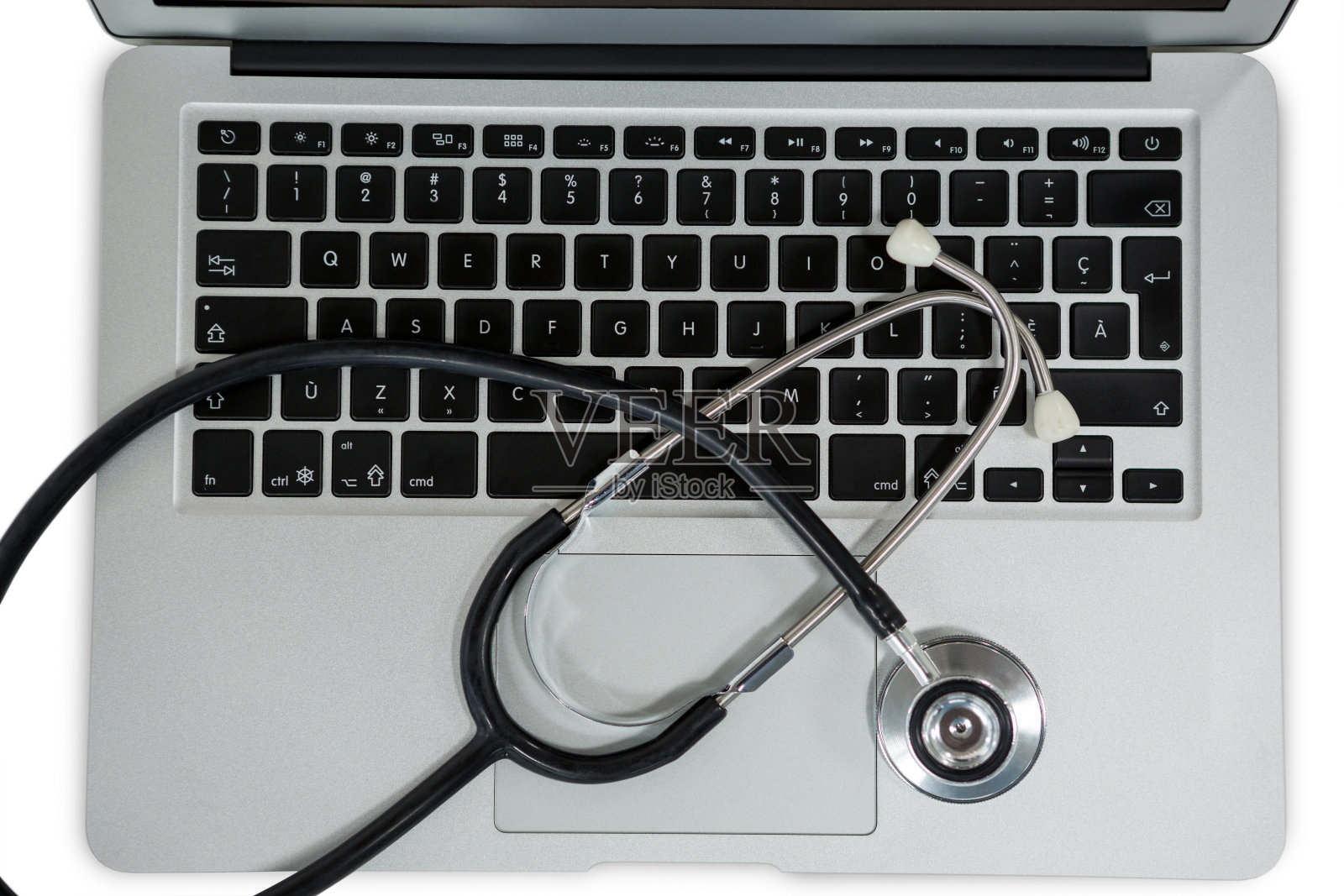 笔记本上听诊器的特写照片摄影图片