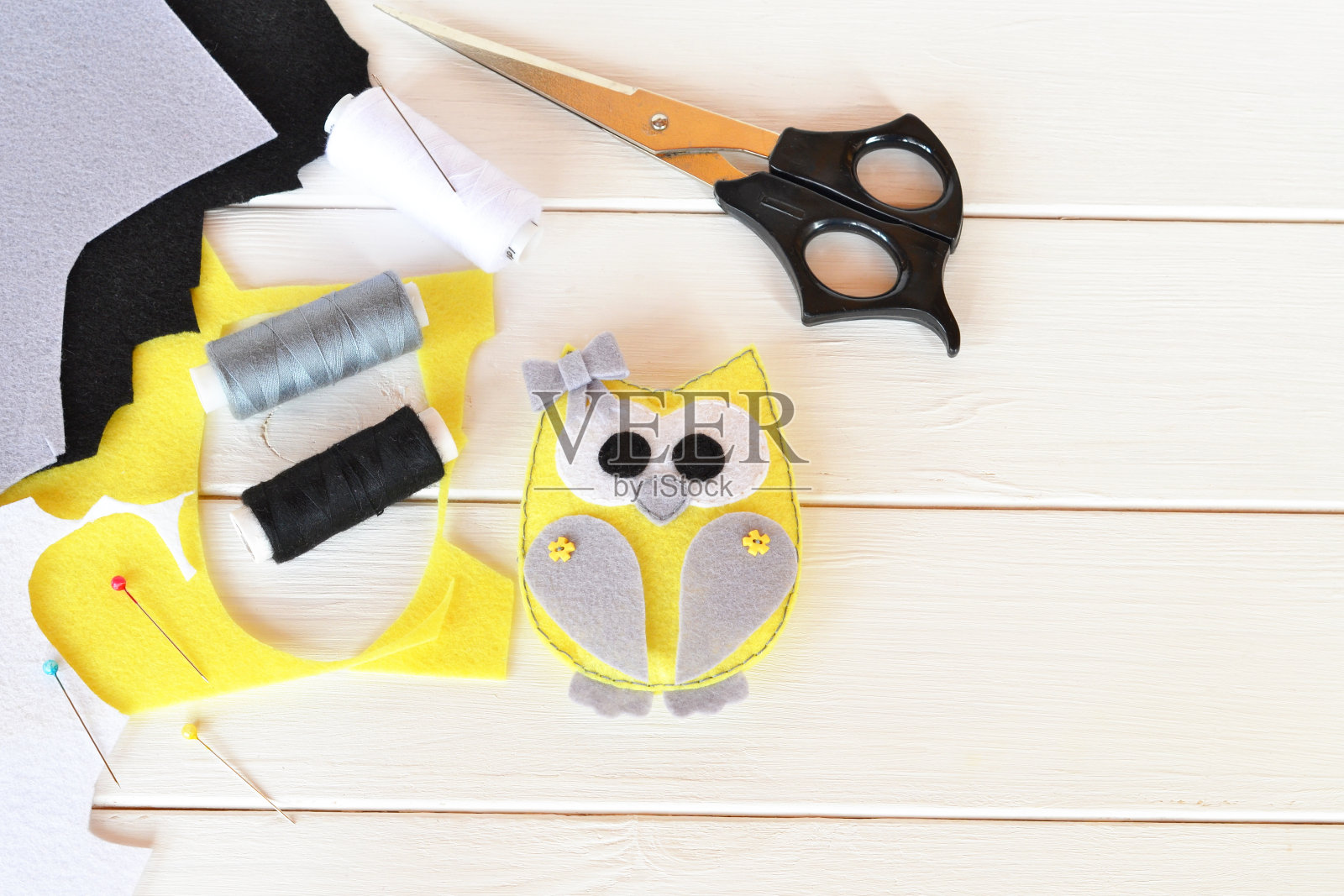 猫头鹰装饰。手缝小布鸟照片摄影图片