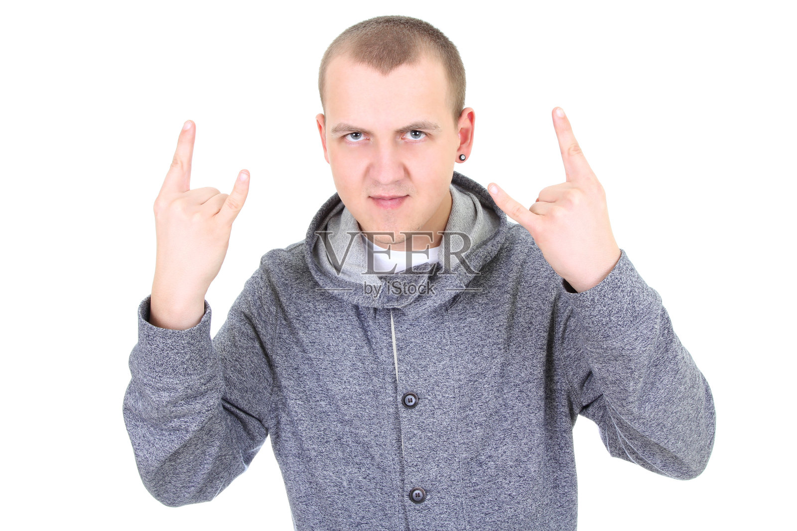 年轻人在做摇滚的象征照片摄影图片