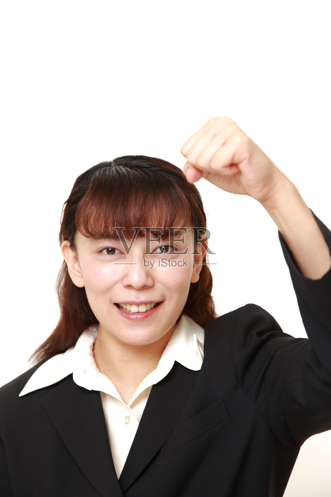 摆着胜利姿态的女商人照片摄影图片