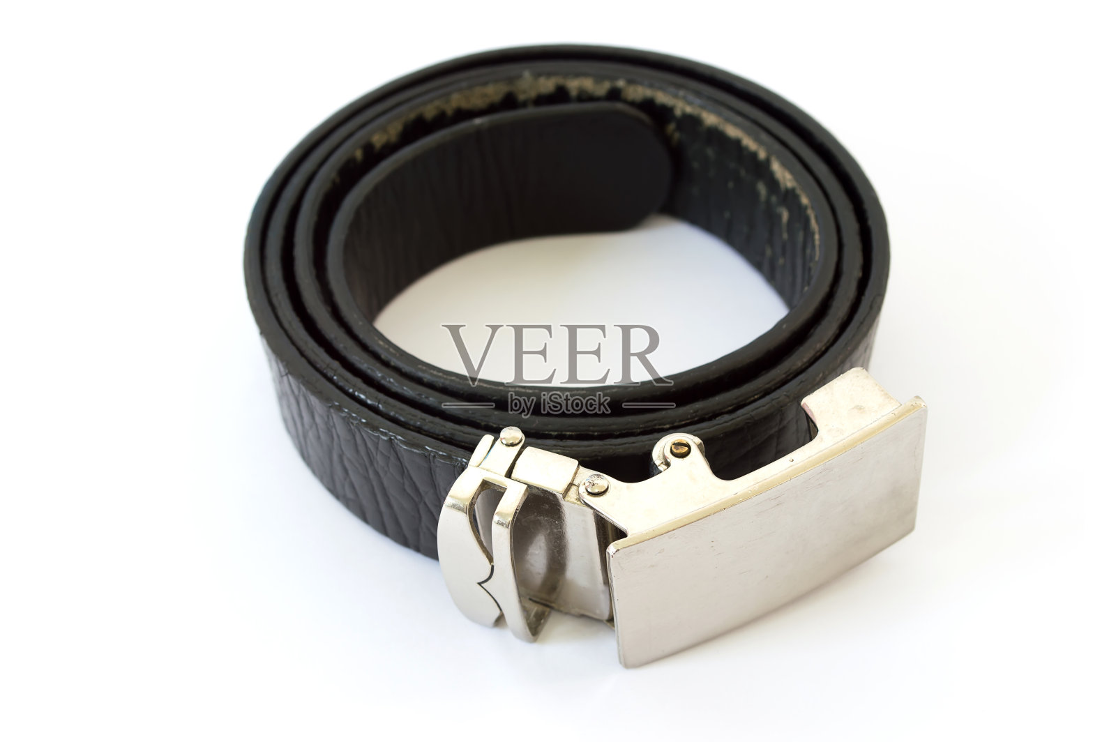 旧的使用黑色皮带孤立的白色背景照片摄影图片