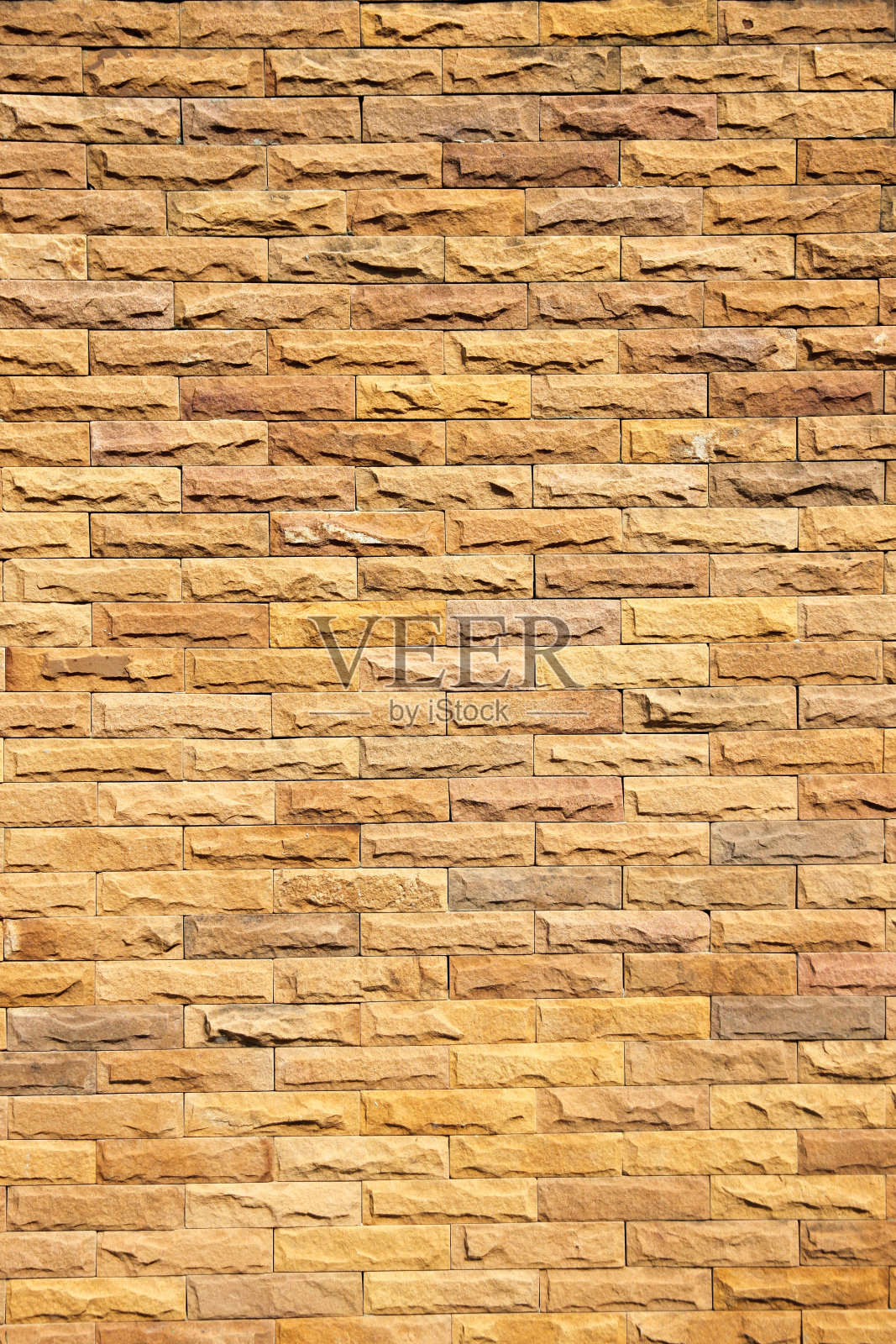 橙色的砖墙。照片摄影图片