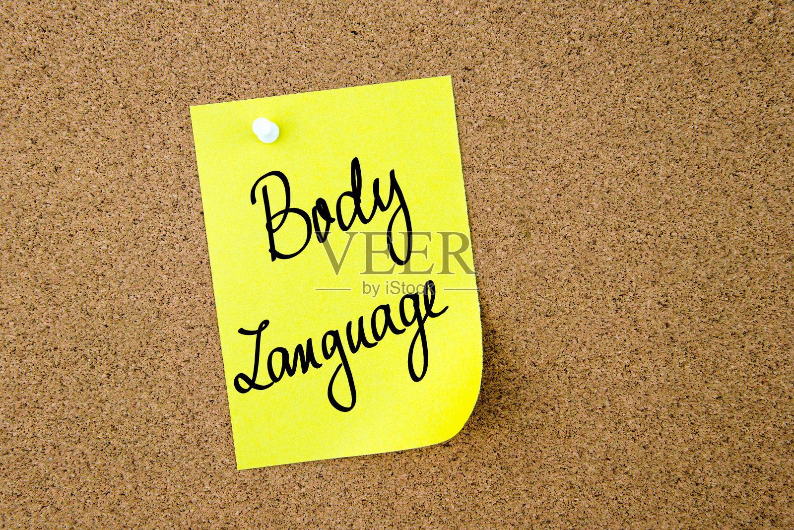 肢体语言写在黄色纸条上照片摄影图片
