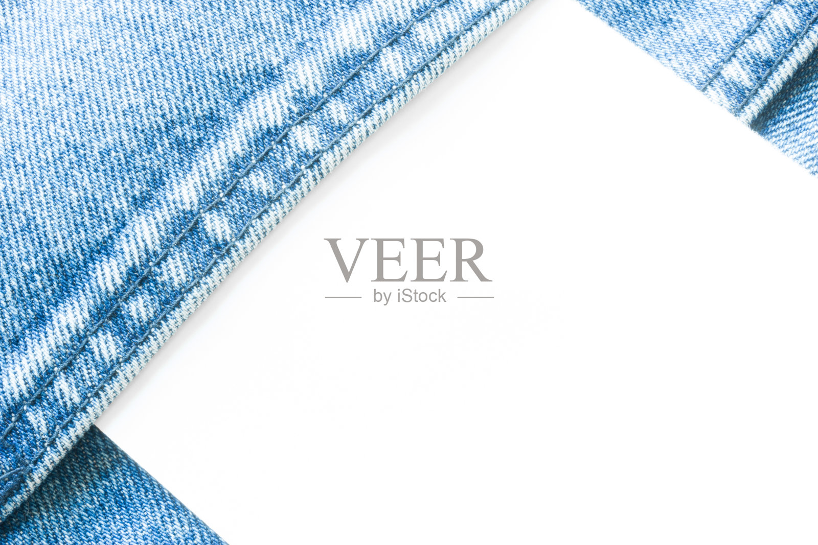 牛仔裤材料与白色背景照片摄影图片