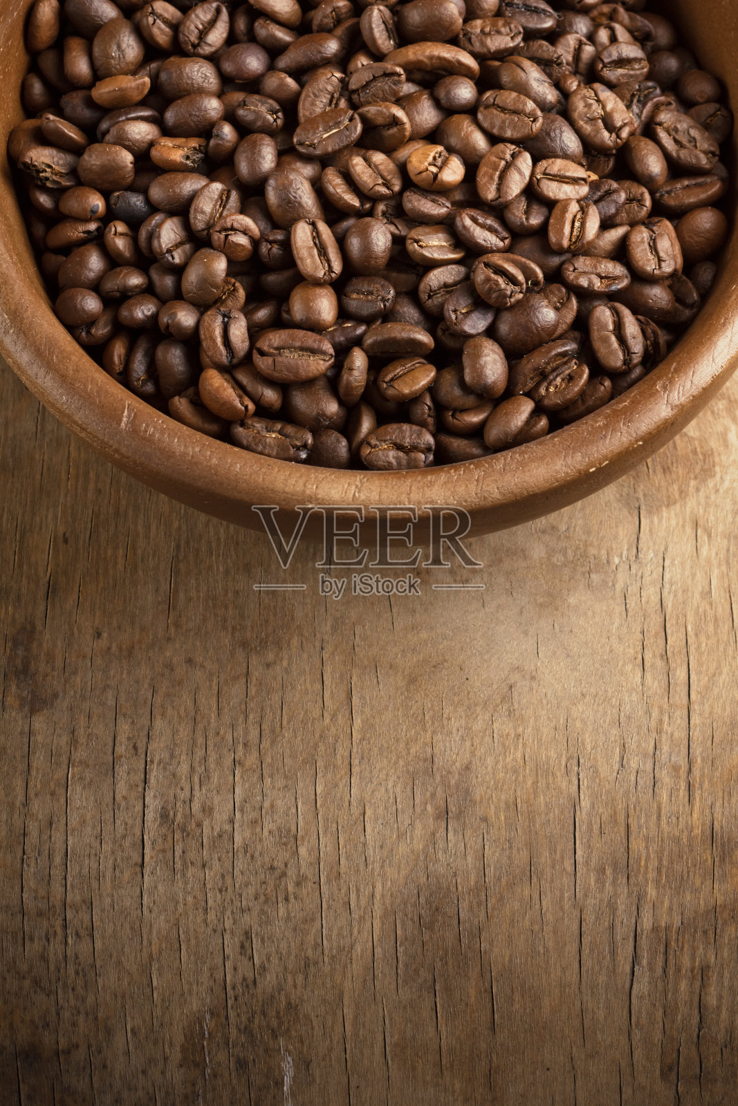 木碗上的咖啡豆照片摄影图片