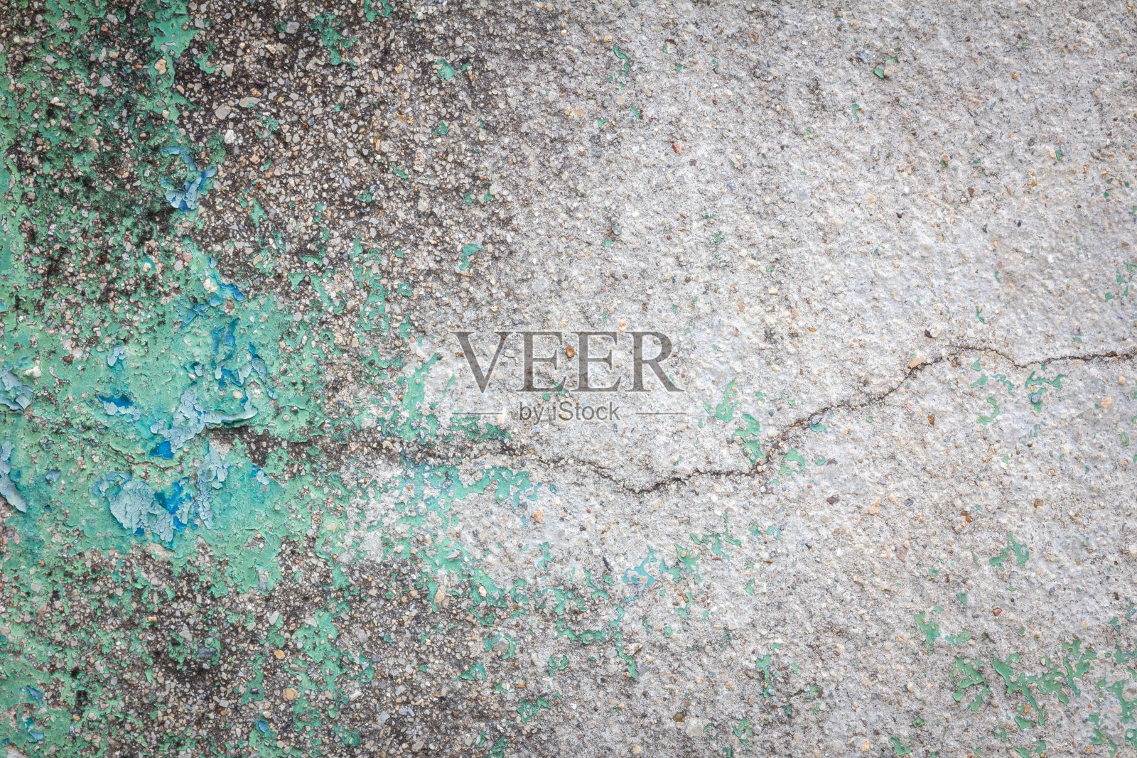 垃圾刮脏了水泥墙，背景照片摄影图片