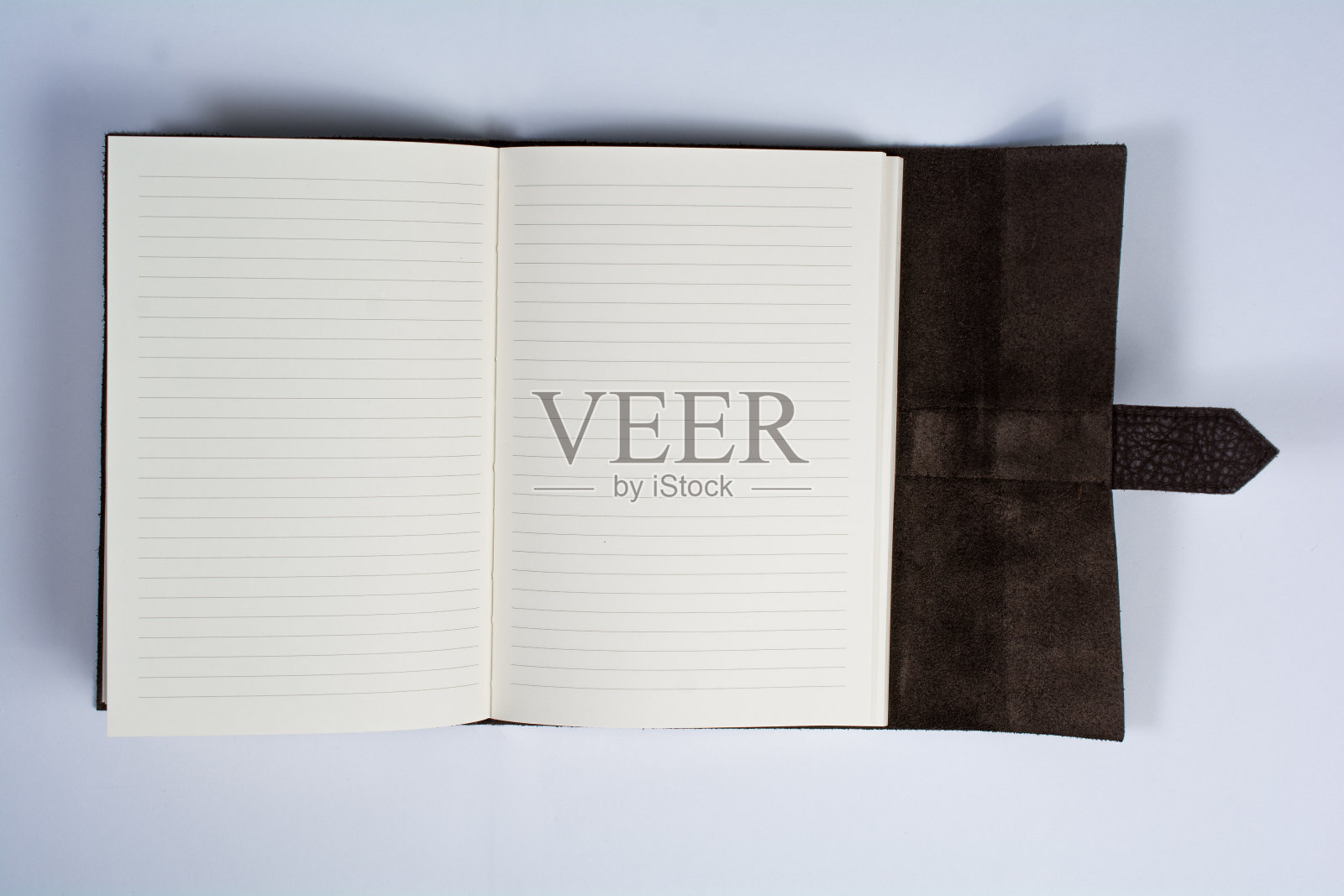 装订皮革杂志书打开孤立的白色顶视图照片摄影图片