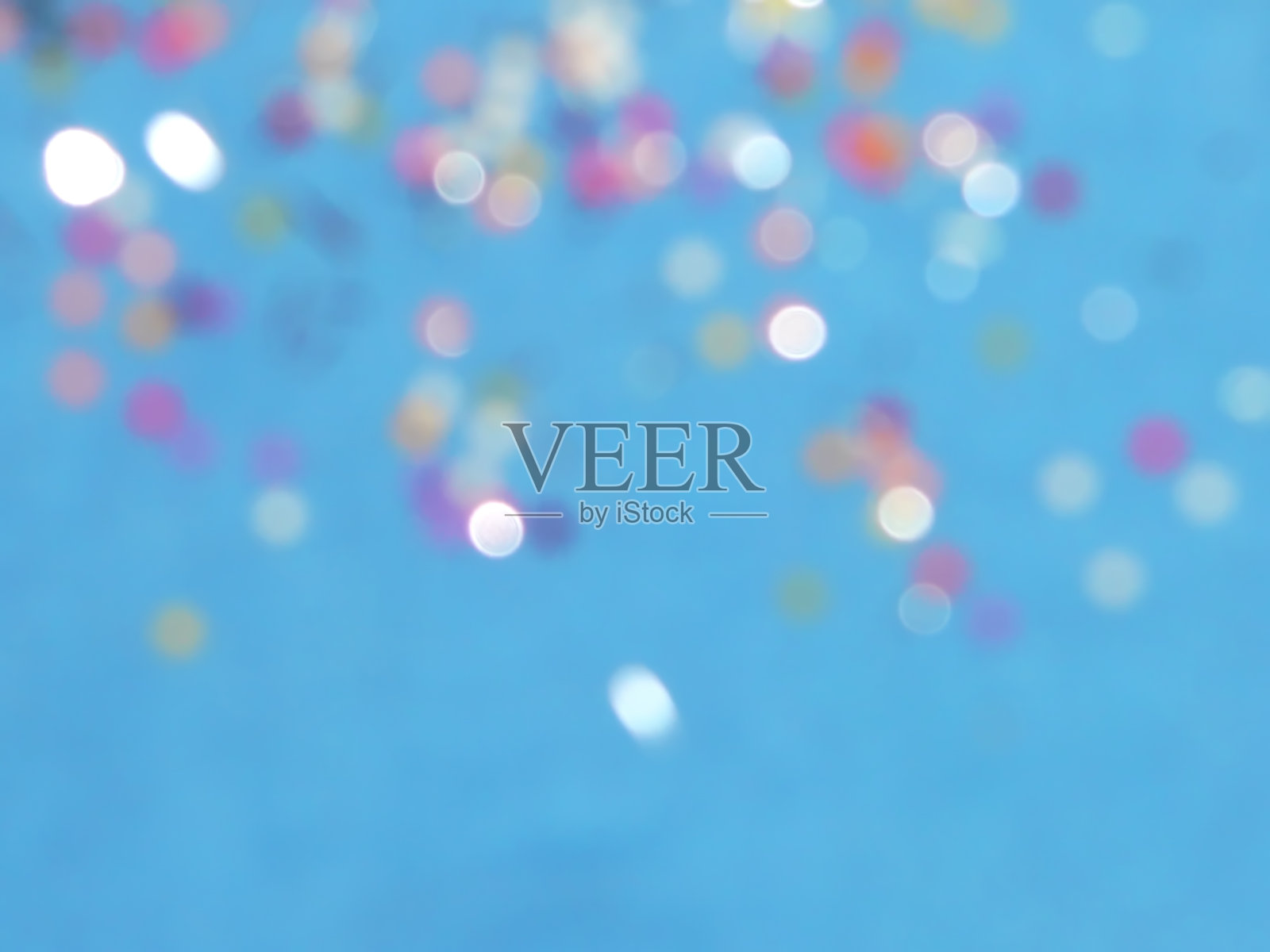 蓝色背景上的眩光照片摄影图片