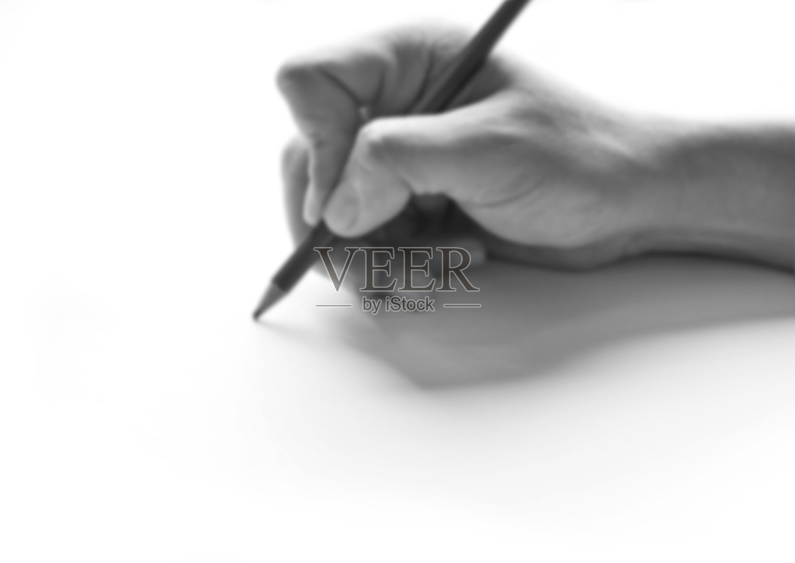 模糊图像的铅笔在纸上的艺术照片摄影图片