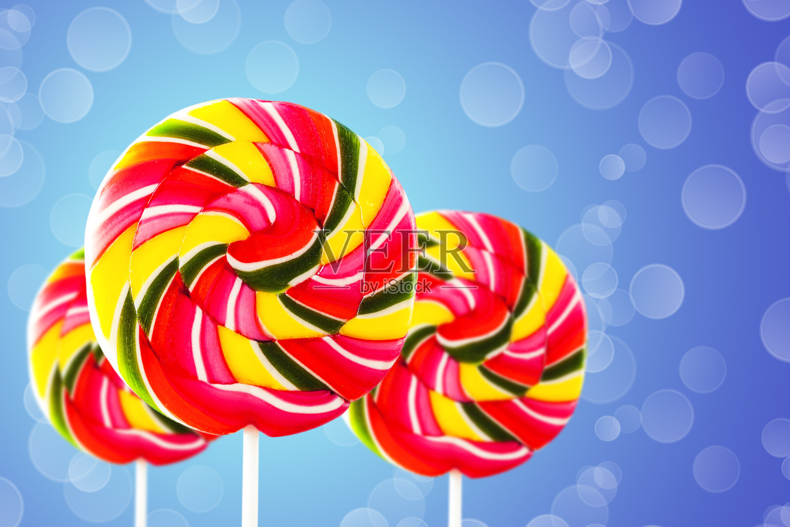 五颜六色的圆形棒棒糖照片摄影图片