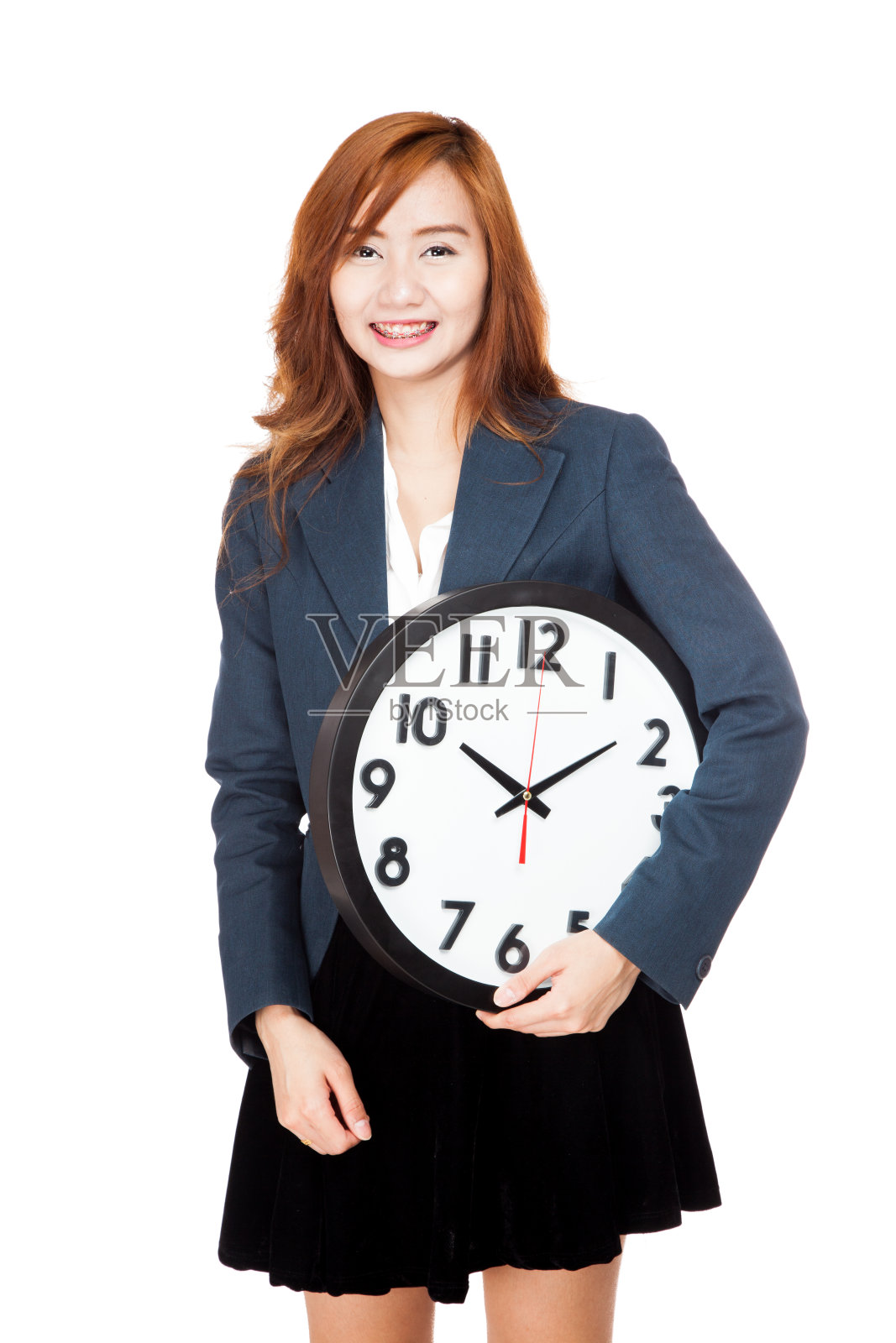 亚洲女商人手持时钟照片摄影图片