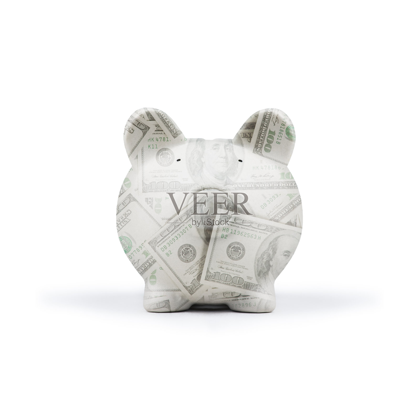 白色背景下的小猪罐特写镜头照片摄影图片