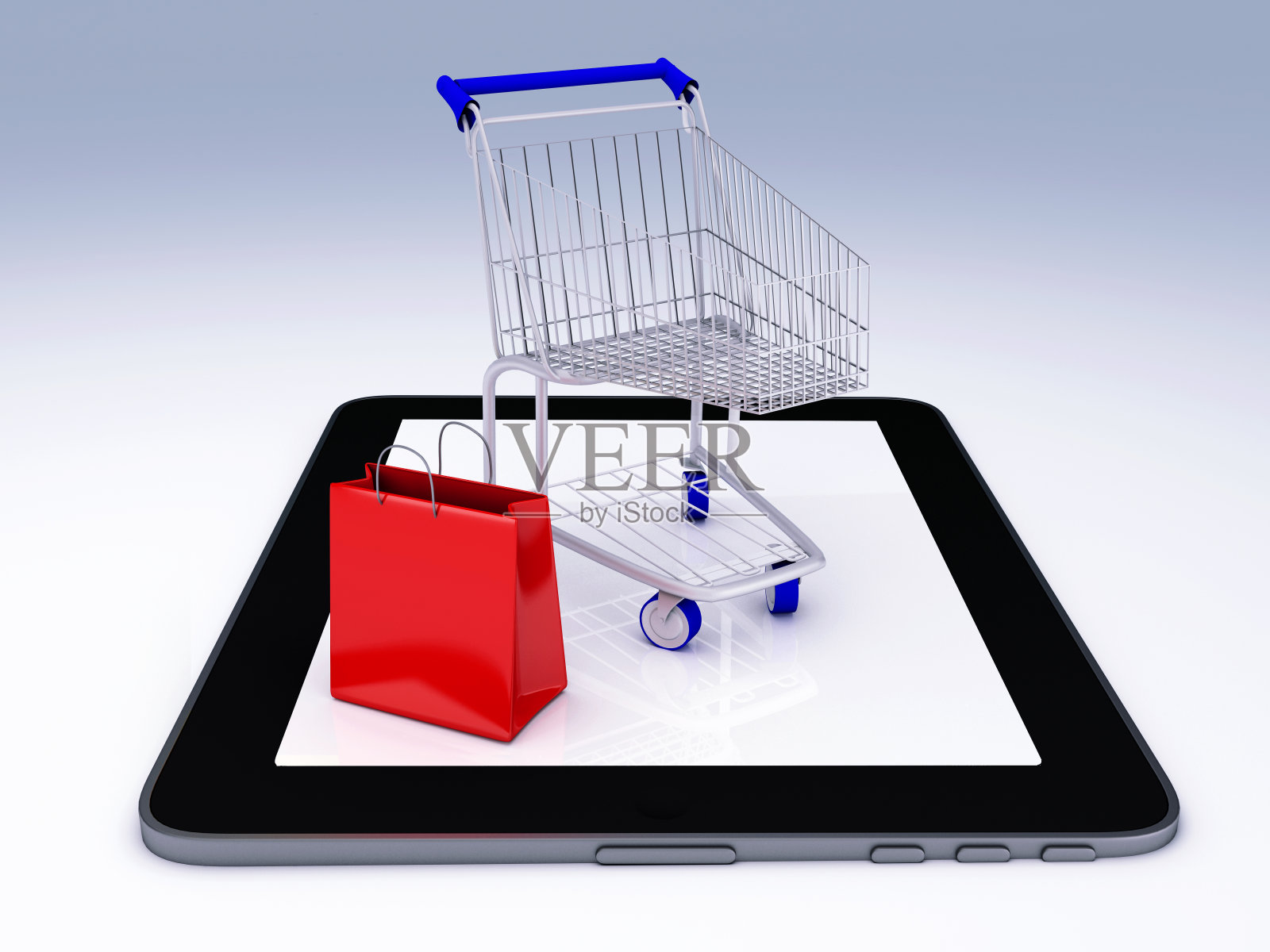 购物车胜过平板电脑。电子商务的概念。照片摄影图片