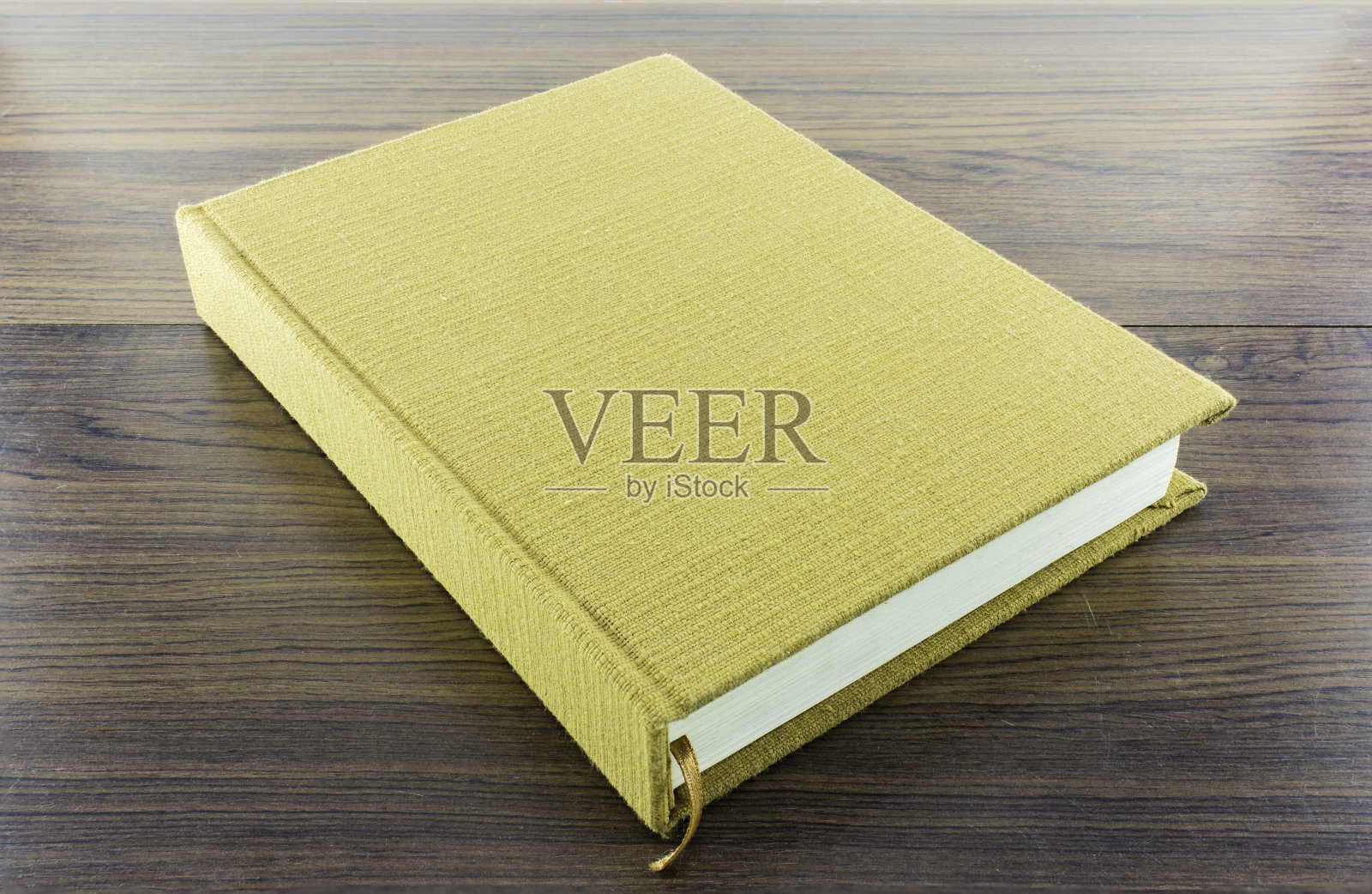 木头上的棕色笔记本照片摄影图片