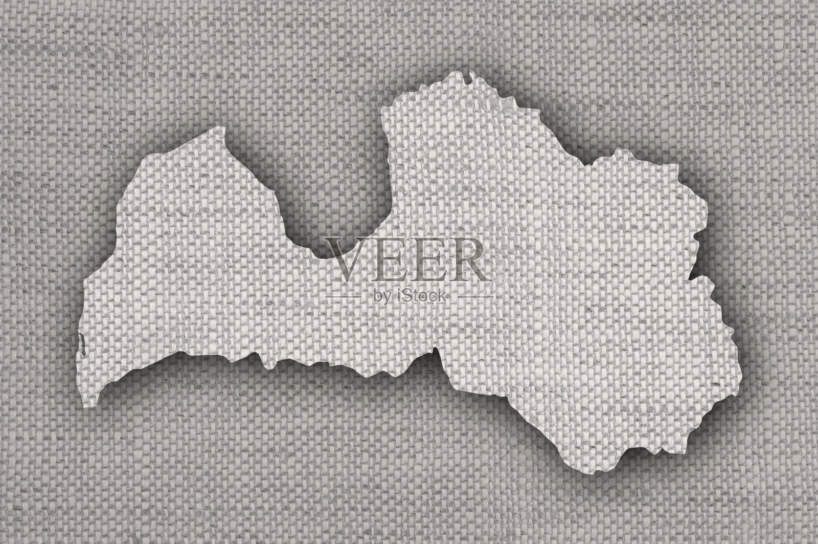 旧亚麻布上的拉脱维亚地图照片摄影图片