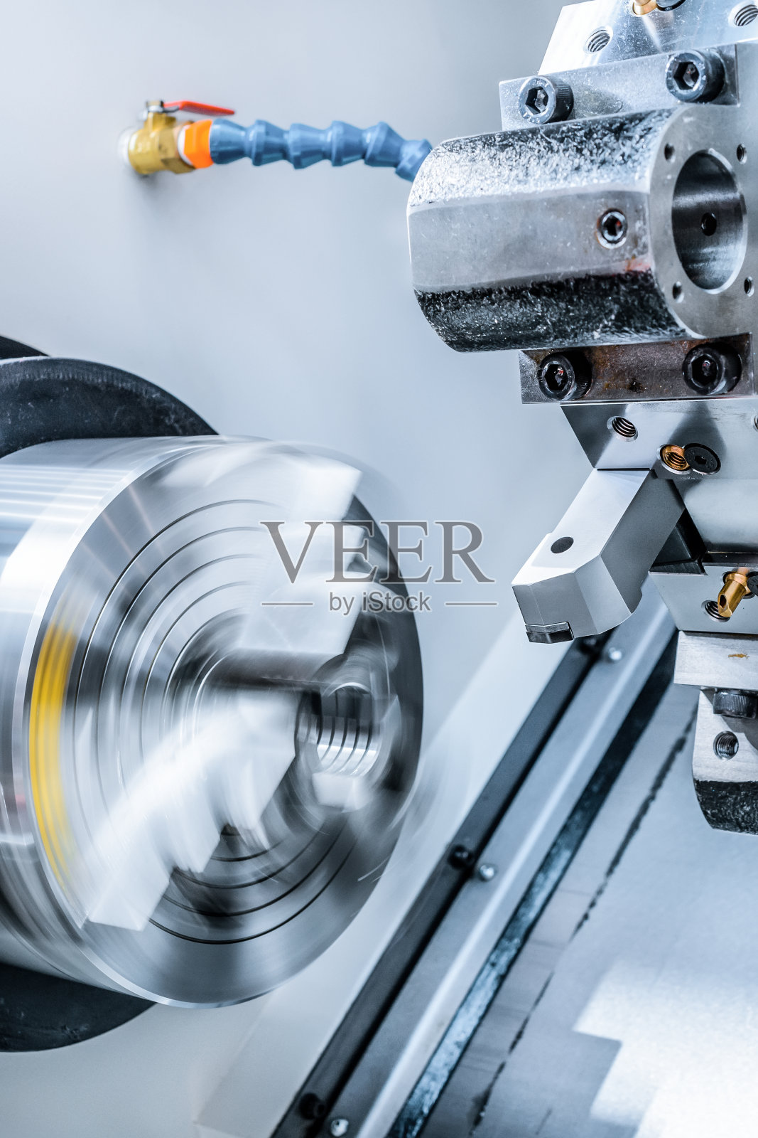 旋转车床卡盘数控金属切割机照片摄影图片