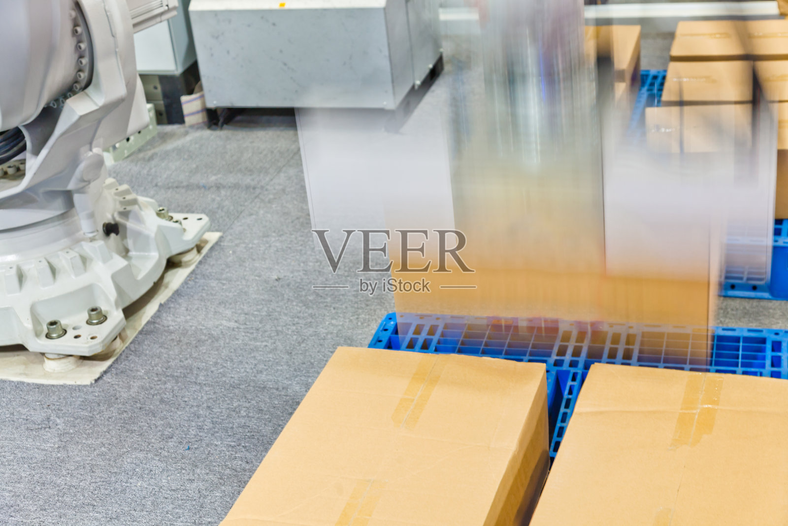 工业运输机器人手臂工作照片摄影图片